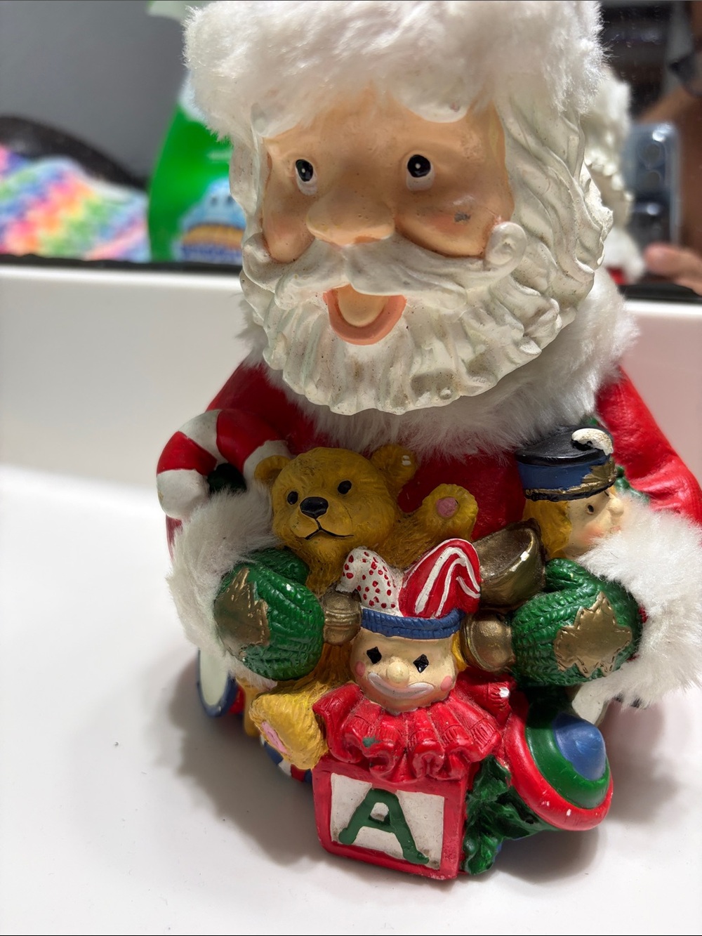 Festive Santa Figurine with Toys - White, Red, Green